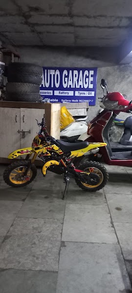 Malik Auto Garage - Photo 1